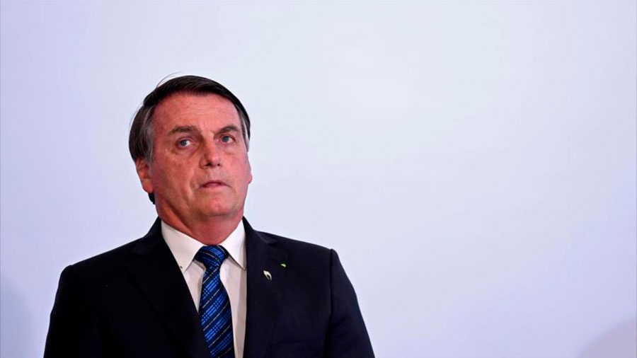 Bolsonaro se irrita ao falar sobre compra de vacina e diz: ‘Só se for na casa da tua mãe’